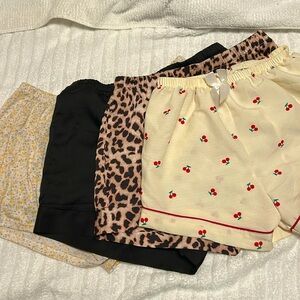 Four pajama bottoms/shorts. All different and fun patterns